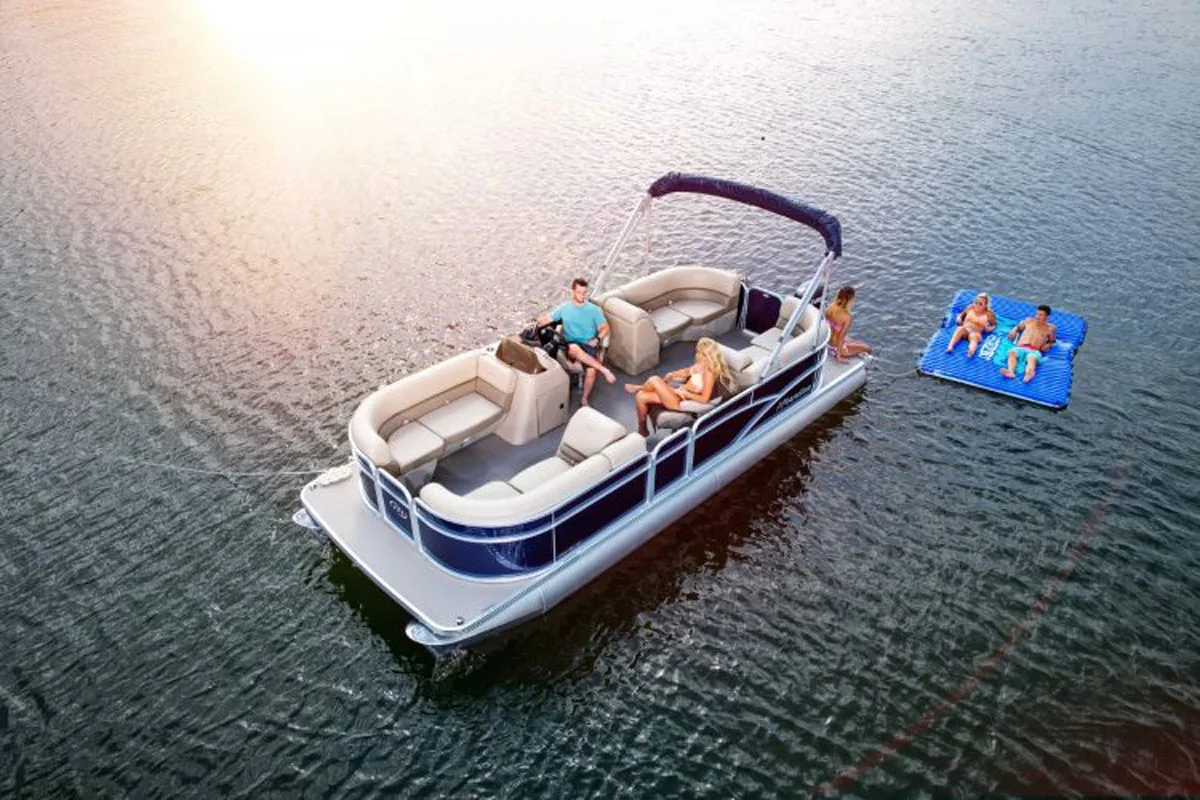 People on a Raft Beside a Pontoon