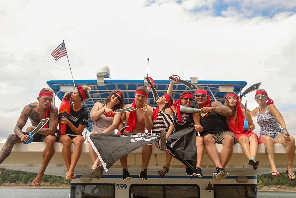 A Group of People on the Back of a Houseboat